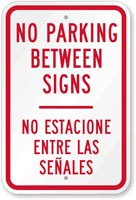 Bilingual No Parking Between Sign