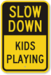 Slow Down Kids Playing Sign