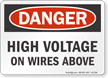 High Voltage On Wires Above OSHA Danger Sign