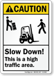 Slow Down High Traffic Area Caution Sign