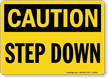 Caution Step Down Sign